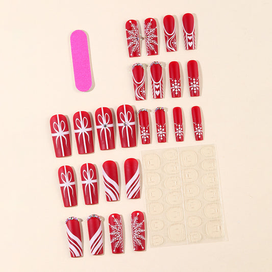 White Coffin Floral Christmas Snowflake press-on nails — worn on both hands, full look