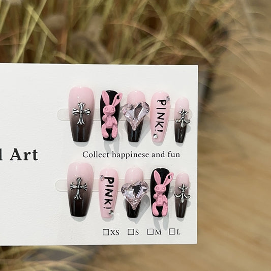 Pink Bunny Girl Medium Coffin press-on nails — worn on both hands, full look