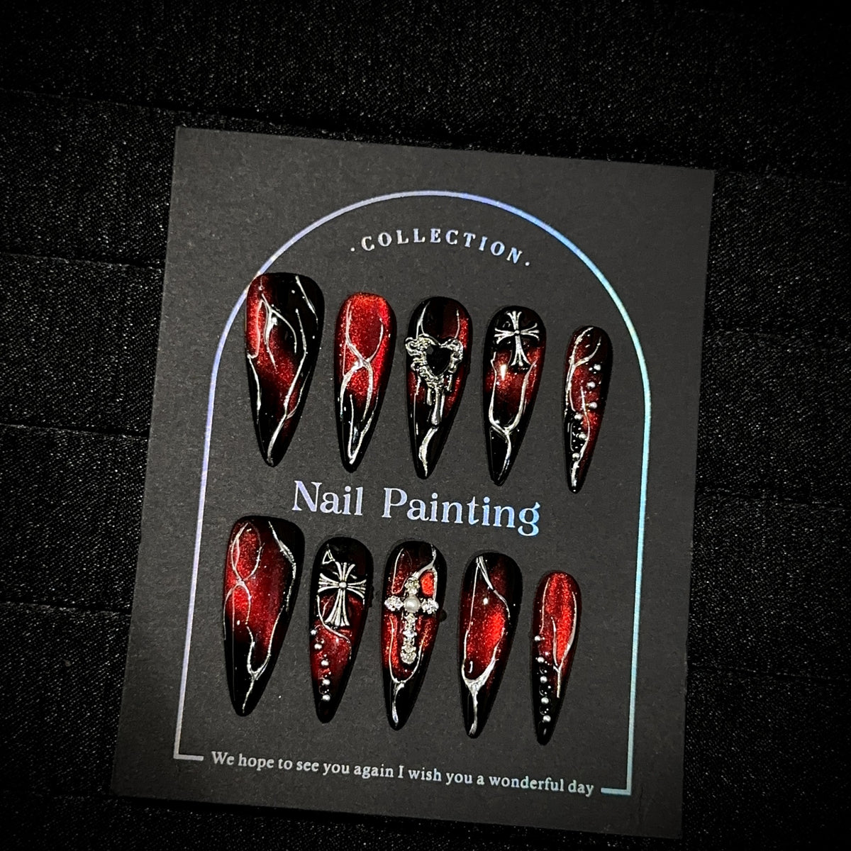 Bloody Heart Long Stiletto Halloween press-on nails — full set in 12 sizes, laid out flat