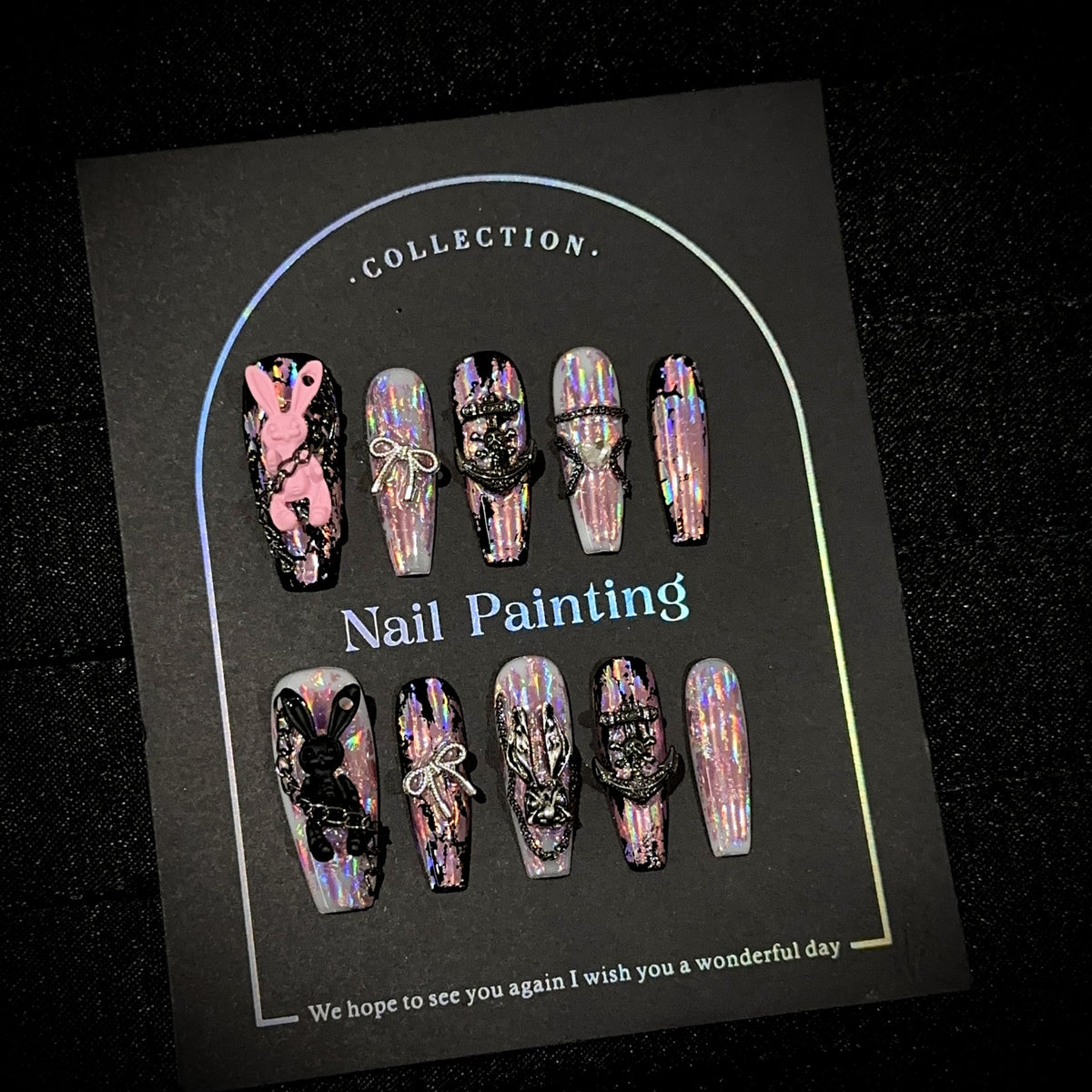 Neon Bunny Long Coffin Holographic press-on nails — worn on both hands, full look