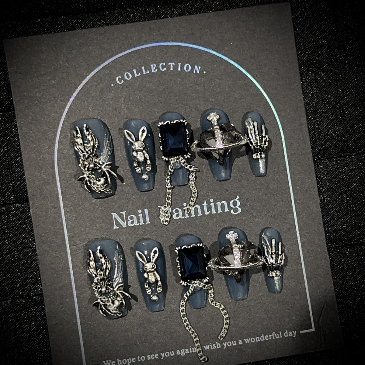 Howl Medium Coffin Halloween press-on nails — worn on hand, close-up