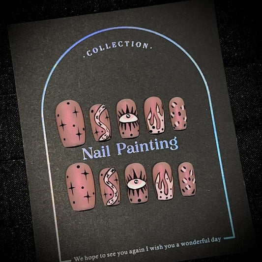 Aurora Pink Snake Medium Square press-on nails in almond — worn on hand, close-up