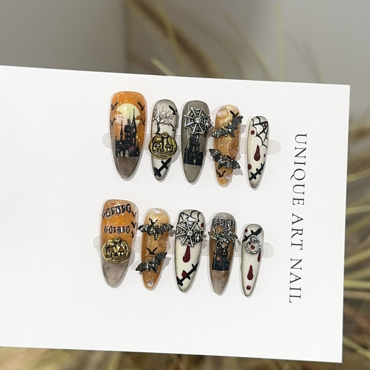 Bat Attack Long Oval Halloween press-on nails — full set in 12 sizes, laid out flat