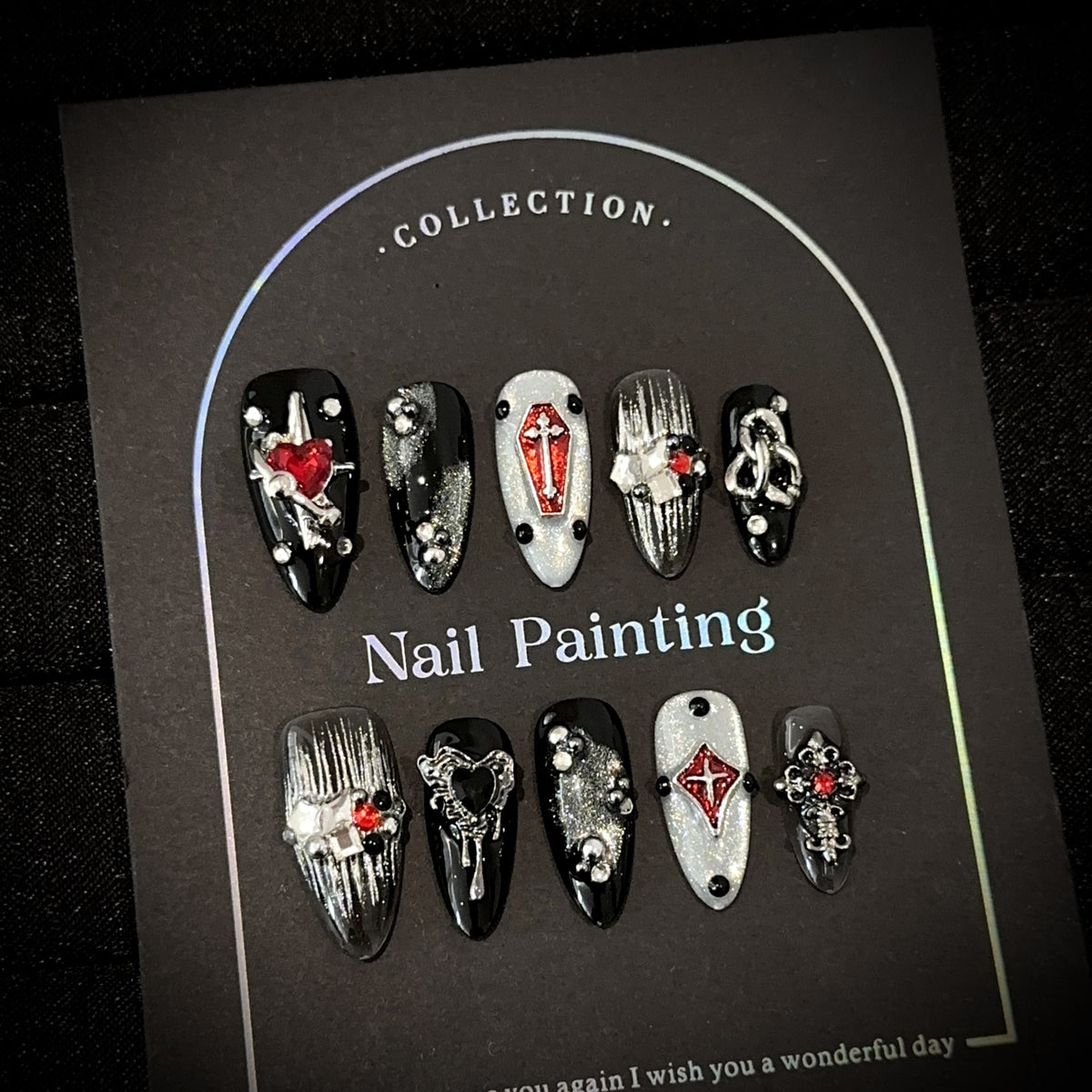 Sinful Heart Almond press-on nails — worn on hand, close-up