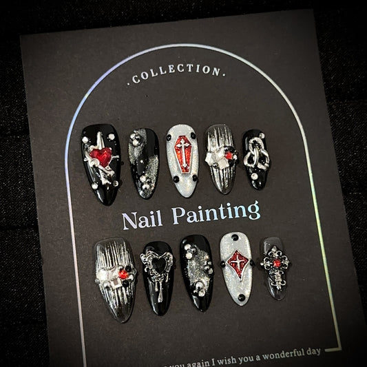 Sinful Heart Almond press-on nails — worn on hand, close-up