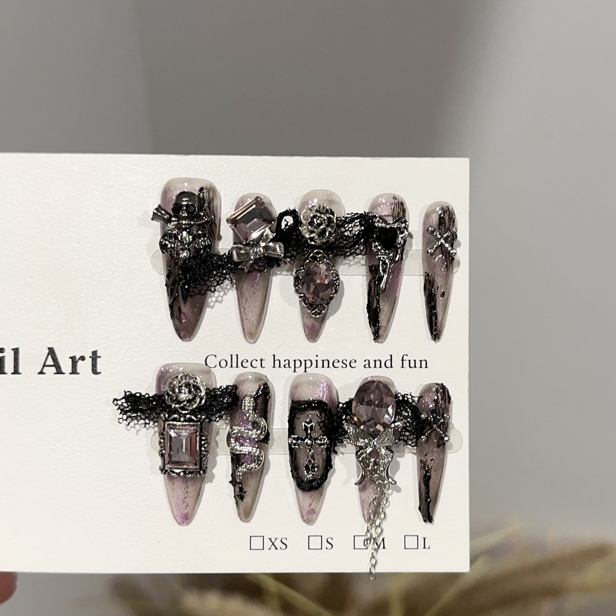 Magic Castle Long Stiletto Halloween press-on nails — full set in 12 sizes, laid out flat