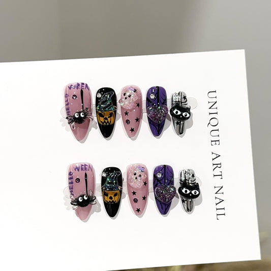 Halloween Carnival Almond press-on nails — worn on hand, close-up