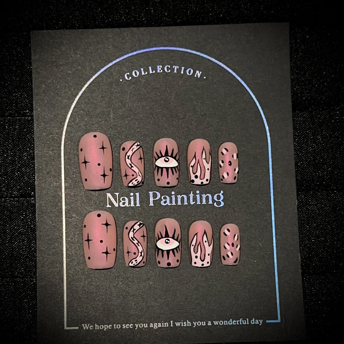 Aurora Pink Snake Medium Square press-on nails in almond — worn on both hands, full look