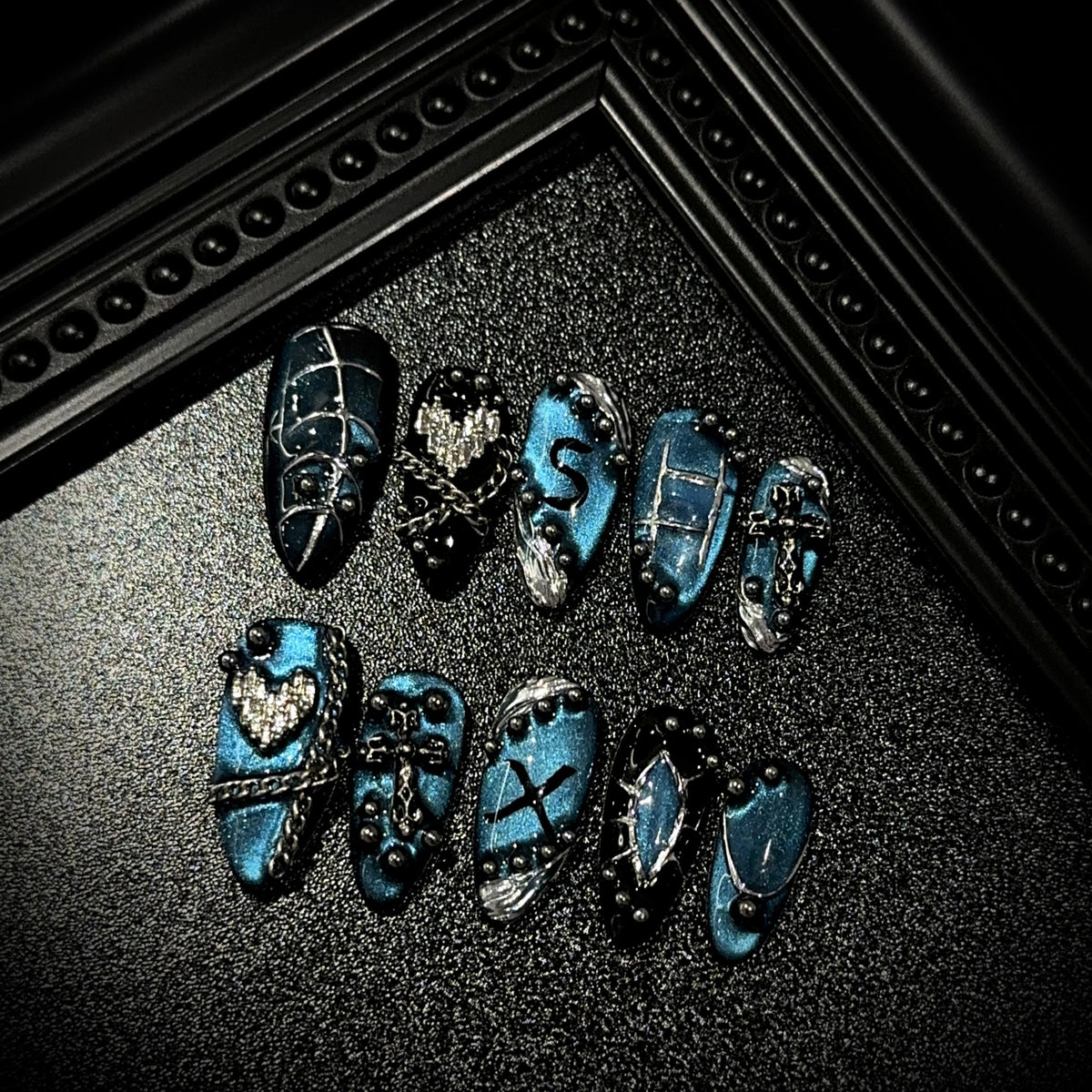 Atlantis Almond Cat Eye press-on nails — worn on both hands, full look