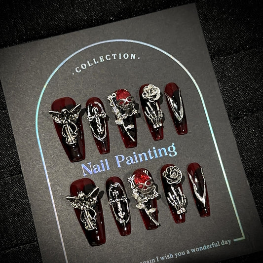 Vampire Long Coffin Halloween press-on nails — worn on hand, close-up