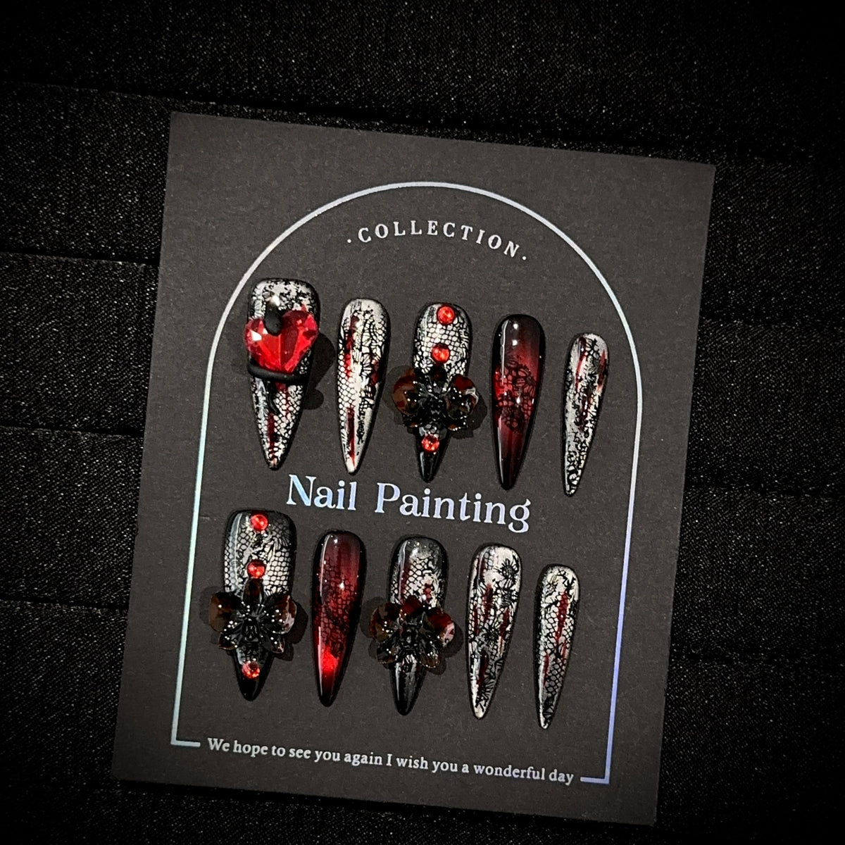 Blood Butterfly Long Stiletto Cat Eye — packaging with nail file, jelly tabs and glue