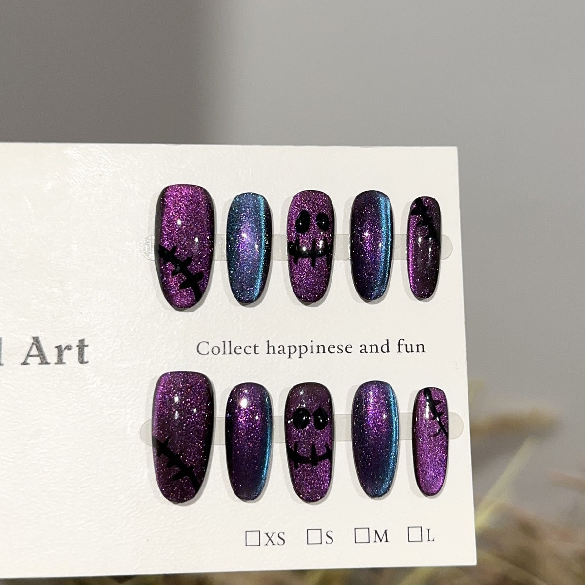 Ghost Face Medium Oval Halloween press-on nails — full set in 12 sizes, laid out flat