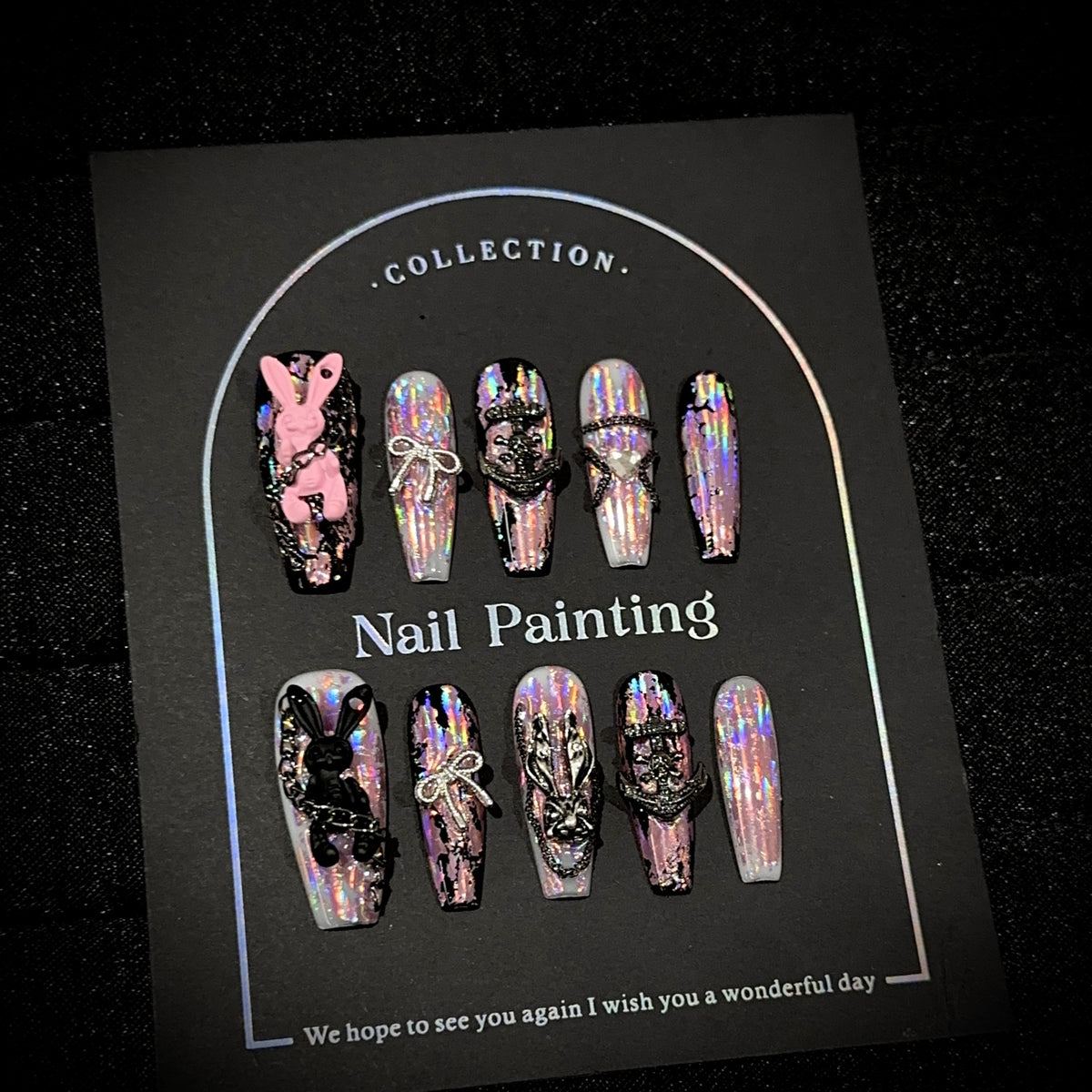 Neon Bunny Long Coffin Holographic press-on nails — worn on hand, close-up