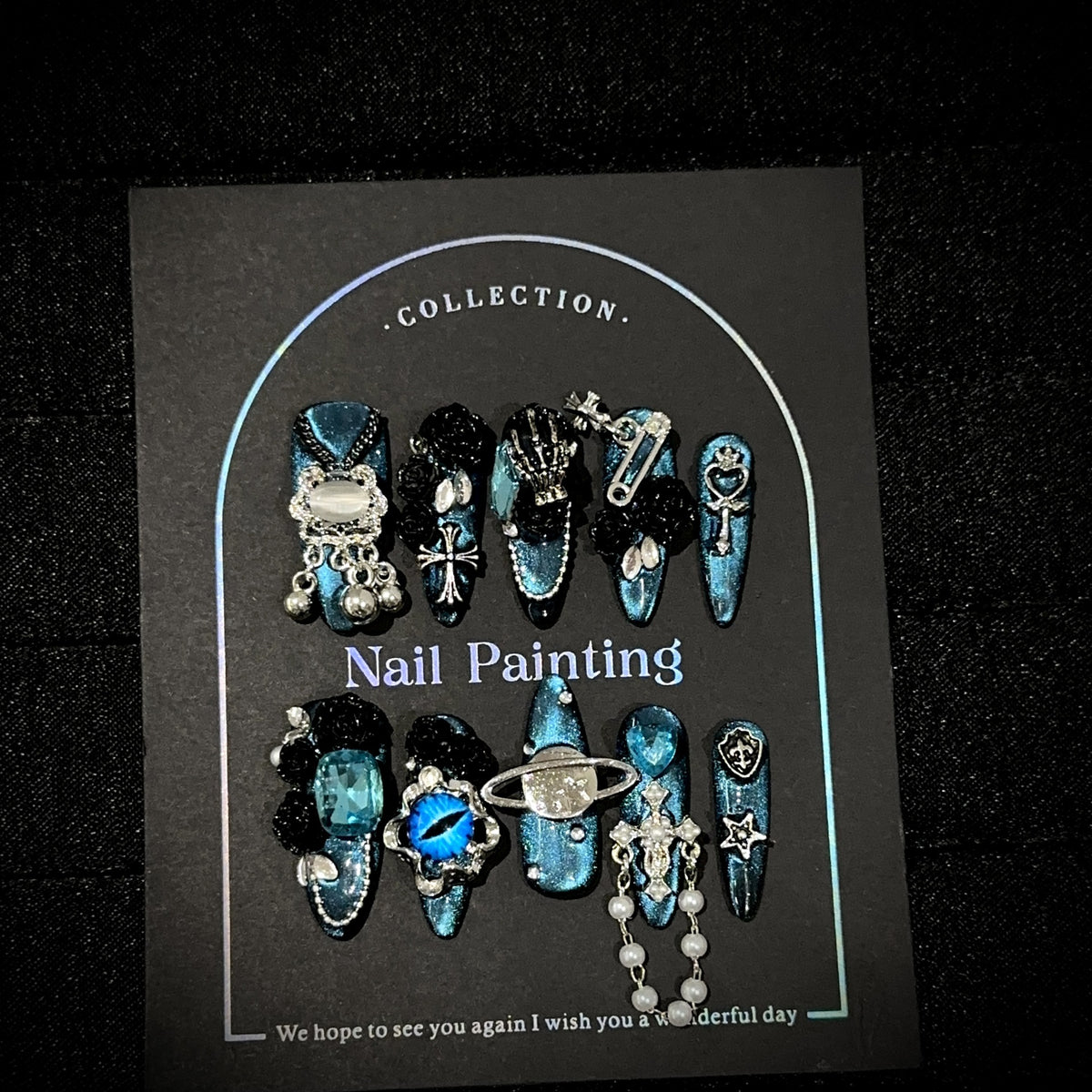 Abyss Long Oval Cat Eye press-on nails — full set in 12 sizes, laid out flat