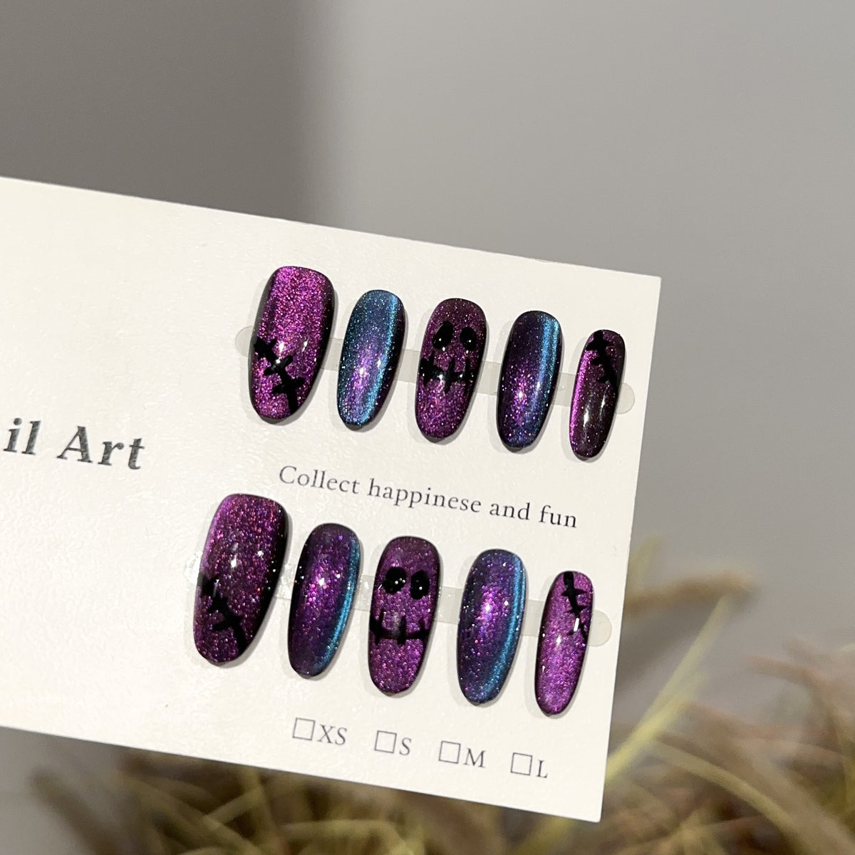 Ghost Face Medium Oval Halloween press-on nails in almond — worn on both hands, full look