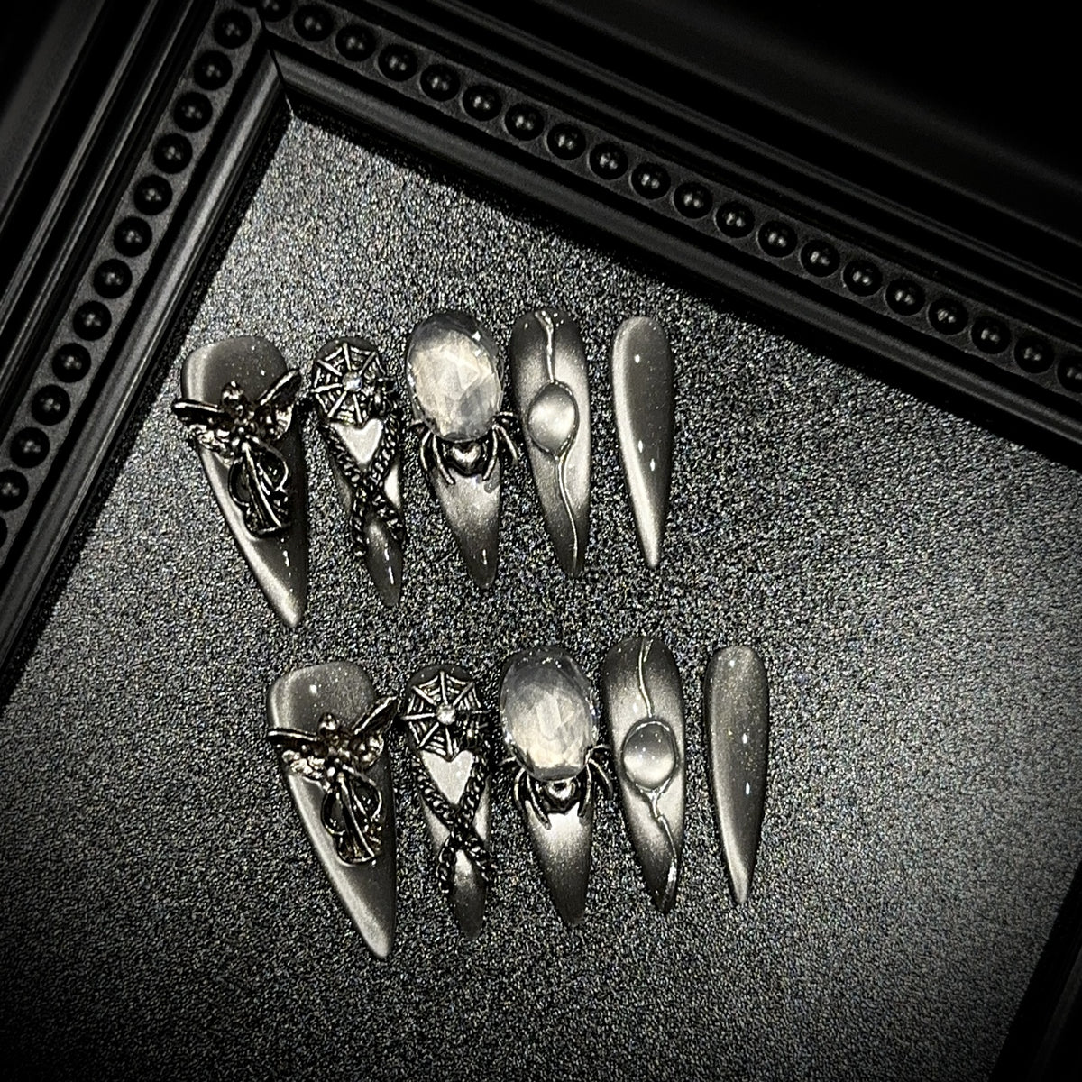 Divine Sacrifice Long Stiletto Cat Eye — packaging with nail file, jelly tabs and glue